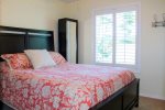 Upstairs Bedroom with Queen Bed at Coastal Cottage